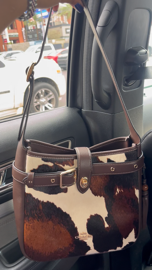 Fur-trimmed shoulder bag